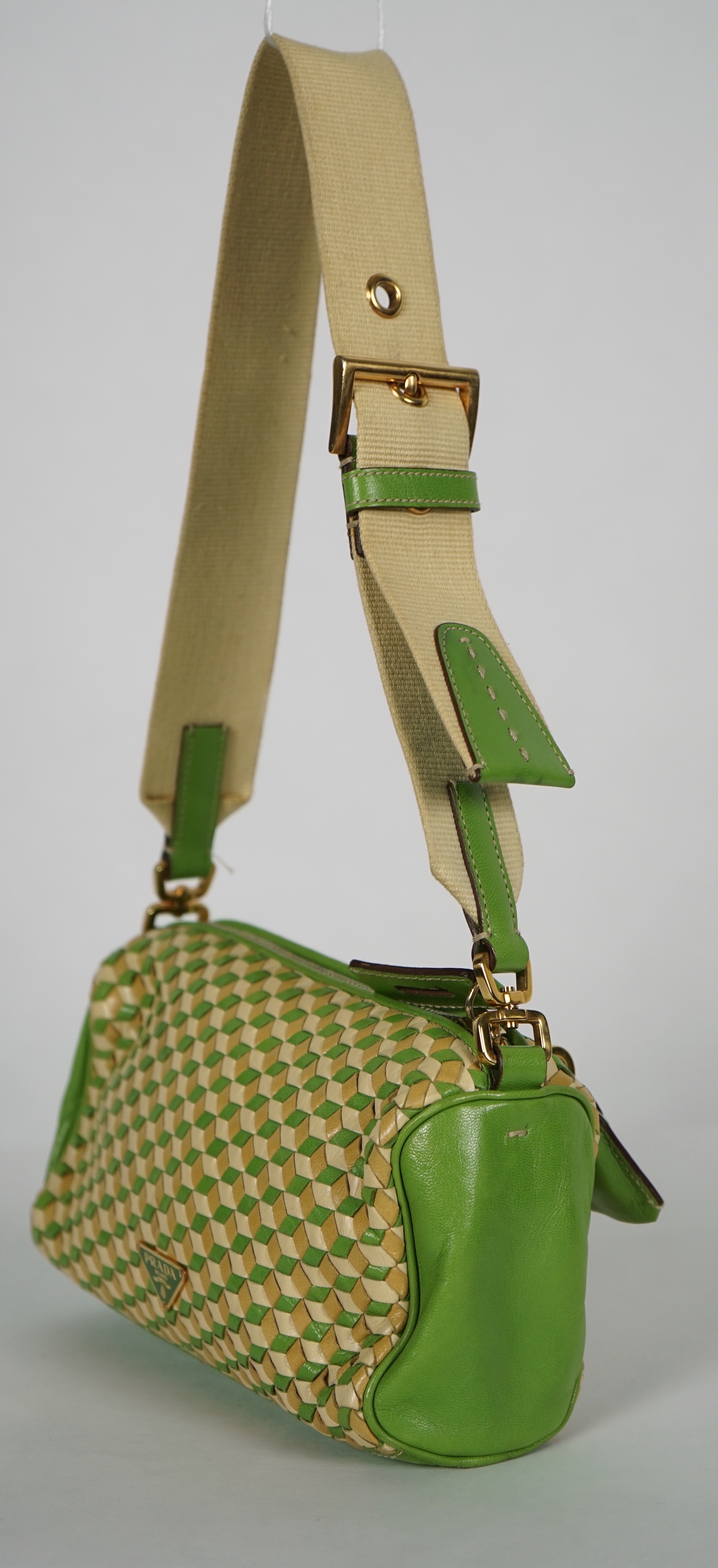 A Prada green and beige leather Intreccio Cube shoulder bag, width 20cm, height 13cm, depth 5.5cm